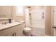 Bathroom showcasing a shower over tub, a modern vanity and tiled floors at 2913 Monate Ct, Henderson, NV 89044