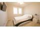 Comfortable bedroom featuring neutral colors, carpeted floor, and a flat-screen television at 2913 Monate Ct, Henderson, NV 89044