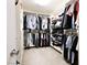 Walk-in closet features custom shelving, ample storage space for clothes, shoes, and accessories at 2913 Monate Ct, Henderson, NV 89044
