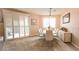 Elegant dining room featuring a modern table with seating for eight and sophisticated decor at 2913 Monate Ct, Henderson, NV 89044