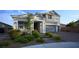 Attractive two-story home features a brick driveway and a manicured front yard landscape at 2913 Monate Ct, Henderson, NV 89044