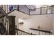 A beautifully appointed foyer with dark staircase and decorative accents and furnishings at 2913 Monate Ct, Henderson, NV 89044