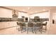 Kitchen with modern stainless appliances, ample counter space, and stylish high top seating at 2913 Monate Ct, Henderson, NV 89044