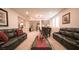 Comfortable living room offering relaxed seating and warm lighting, perfect for entertaining at 2913 Monate Ct, Henderson, NV 89044