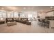 Open-concept living area with spacious seating, dining area, and breakfast bar at 2913 Monate Ct, Henderson, NV 89044