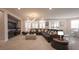 Expansive living room with plush seating, modern decor, and large windows for natural light at 2913 Monate Ct, Henderson, NV 89044
