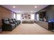 State-of-the-art theater room featuring comfortable seating and mood lighting at 2913 Monate Ct, Henderson, NV 89044