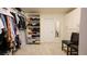 A well-organized walk-in closet with custom shelving, storage units, and ample room for clothing at 2913 Monate Ct, Henderson, NV 89044