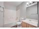 Clean bathroom featuring a tub-shower combo, modern vanity, and a neutral color palette at 3060 Tarpon Dr # 102, Las Vegas, NV 89120
