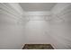 Walk-in closet with wire shelving and wood-look flooring at 3060 Tarpon Dr # 102, Las Vegas, NV 89120