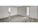 Inviting living room features wood-look floors and bright windows, great space at 3060 Tarpon Dr # 102, Las Vegas, NV 89120