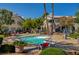 Enjoy the community pool surrounded by lush landscaping, seating and beautiful multi-story buildings at 3060 Tarpon Dr # 102, Las Vegas, NV 89120