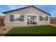 Outdoor covered patio, low maintenance landscape, including artificial turf at 314 S Parawan St # Lot 13, Henderson, NV 89015
