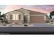 Charming single-story home with desert landscaping and a two-car garage at 314 S Parawan St # Lot 13, Henderson, NV 89015