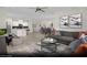 Spacious living room with modern decor, with open concept to kitchen and dining at 314 S Parawan St # Lot 13, Henderson, NV 89015