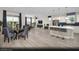 Open concept design with views of kitchen, dining, and living room with modern decor at 314 S Parawan St # Lot 13, Henderson, NV 89015