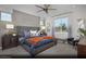 Comfortable primary bedroom featuring a king bed, soft lighting, and neutral color palette at 314 S Parawan St # Lot 13, Henderson, NV 89015