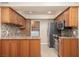 Updated kitchen features stainless steel appliances, granite countertops, and access to the laundry area at 3189 Pinehurst Dr # B, Las Vegas, NV 89109
