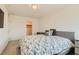 Inviting bedroom with a comfortable bed, natural light, and a closet entrance, ideal for relaxation at 3194 Lumassina Way, Henderson, NV 89044
