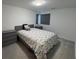 Bedroom with neutral walls, carpet, and two dressers at 3194 Lumassina Way, Henderson, NV 89044