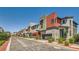 Street view showcasing a row of modern homes with well-maintained landscaping in a planned community at 3194 Lumassina Way, Henderson, NV 89044