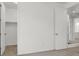 Neutral bedroom featuring a closet with bi-fold doors and neutral carpet at 348 Andy Wheeler Dr, Henderson, NV 89011