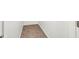 Tiled hallway provides access within the residence at 348 Andy Wheeler Dr, Henderson, NV 89011