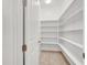 Pantry provides ample shelving for storage in the home at 348 Andy Wheeler Dr, Henderson, NV 89011