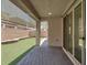 Covered patio overlooking the backyard at 348 Andy Wheeler Dr, Henderson, NV 89011