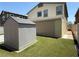 Backyard featuring a well-maintained storage shed, with a modern, secure design at 4104 Free Bird Crest Ave, North Las Vegas, NV 89081