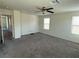 Bedroom featuring carpet flooring and two windows at 4104 Free Bird Crest Ave, North Las Vegas, NV 89081
