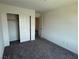 Clean bedroom featuring a closet for storage, and modern lighting at 4104 Free Bird Crest Ave, North Las Vegas, NV 89081