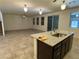 Modern kitchen featuring granite countertops, an island with a sink, and stainless steel appliances at 4104 Free Bird Crest Ave, North Las Vegas, NV 89081