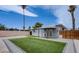 Spacious backyard with a new patch of green grass, perfect for relaxation and outdoor activities at 4831 Vermont Ave, Las Vegas, NV 89107