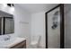 Modern bathroom featuring updated vanity and fixtures, and a sleek glass-enclosed shower at 4831 Vermont Ave, Las Vegas, NV 89107