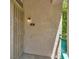 Front door entrance with security door and a wall lamp at 5155 W Tropicana Ave # 2017, Las Vegas, NV 89103