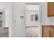 Hallway view showcasing the neutral interior paint and access to the bedroom and living room at 5155 W Tropicana Ave # 2017, Las Vegas, NV 89103