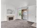 Spacious living room features fireplace and sliding glass door to outdoor patio at 5155 W Tropicana Ave # 2017, Las Vegas, NV 89103