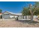 A charming single-story home with attached two-car garage and rock front yard at 5368 Regal Ave, Las Vegas, NV 89146