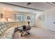 Bright living room with white walls, large windows, and comfortable white couch at 5368 Regal Ave, Las Vegas, NV 89146