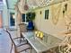 Charming poolside patio with seating, perfect for relaxing and entertaining near a refreshing pool at 5368 Regal Ave, Las Vegas, NV 89146