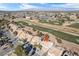 Aerial view of the house with golf course nearby at 5458 Walton Heath Ave, Las Vegas, NV 89142