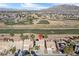 Aerial view of the property with surrounding golf course and community at 5458 Walton Heath Ave, Las Vegas, NV 89142