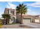 Inviting two-story home with mature landscaping, featuring a tile roof and two-car garage at 5458 Walton Heath Ave, Las Vegas, NV 89142