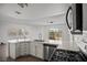 Stylish kitchen featuring stainless steel appliances, a large sink, and ample counter space at 5458 Walton Heath Ave, Las Vegas, NV 89142