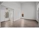 Spacious living room boasts high ceilings and new wood flooring at 5458 Walton Heath Ave, Las Vegas, NV 89142
