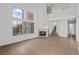 Bright living room with high ceilings features a fireplace and contemporary design at 5458 Walton Heath Ave, Las Vegas, NV 89142