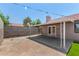 A backyard with a covered patio area, perfect for entertaining at 5734 Duval Dr, Las Vegas, NV 89156