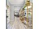 Inviting entryway featuring stylish shelving and a clear view into the living spaces at 6106 Castle Gardens Ave, Las Vegas, NV 89130