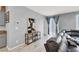 Cozy living room with stylish decor, ample natural light, and a comfortable sofa at 6106 Castle Gardens Ave, Las Vegas, NV 89130